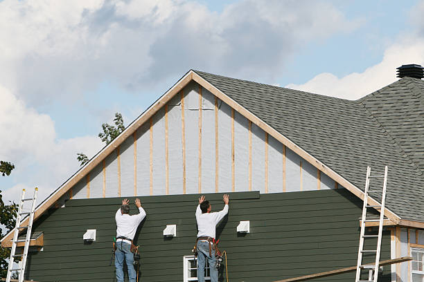 Professional Siding Contractor technician working in Henderson, NC